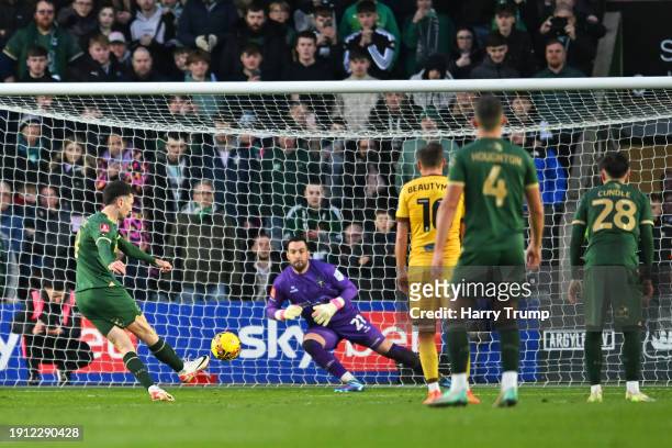 Ryan Hardie of Plymouth Argyle scores his team's second goal from the penalty spot during the Emirates FA Cup Third Round match between Plymouth...