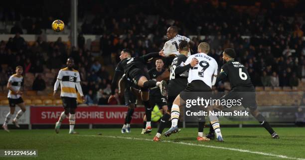 Uche Ikpeazu of Port Vale scores their second goal during the Sky Bet League One match between Port Vale and Charlton Athletic at Vale Park on...