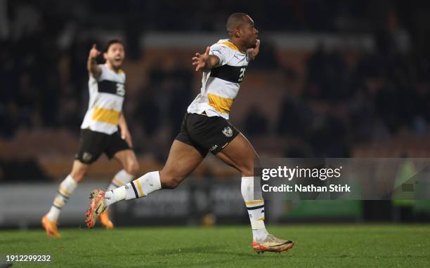 Uche Ikpeazu of Port Vale celebrates after he scores their second goal during the Sky Bet League One match between Port Vale and Charlton Athletic at...
