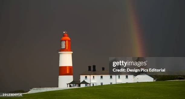 Rainbow And A Red And White Lighthouse. South Shields, Tyne And Wear, England.