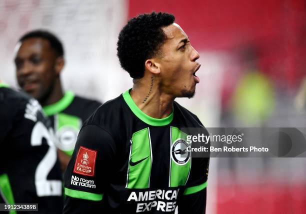 Joao Pedro of Brighton & Hove Albion celebrates scoring his team's fourth goal during the Emirates FA Cup Third Round match between Stoke City and...