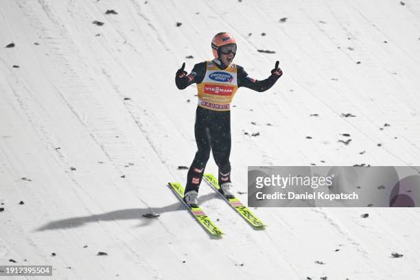 Stefan Kraft of Austria celebrates after competing in the Second Round Jump during the FIS World Cup Ski Jumping Four Hills Tournament Men Individual...