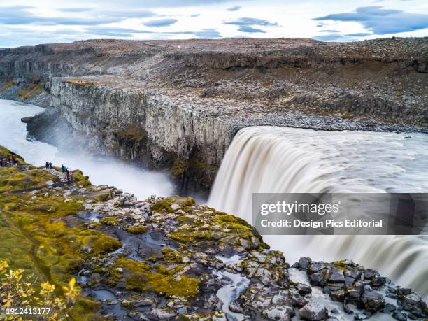 Dettifoss waterfall, in Vatnajokull National Park, is reputed to be the second most powerful waterfall in Europe after the Rhine Falls. Nordurthing,...