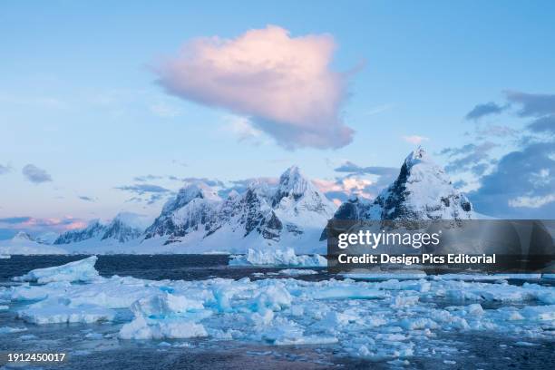 Mountains, ice and snow along the Gerlache Strait in Western Antarctica. Antarctica.