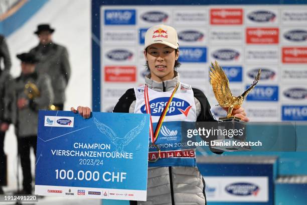 First Place, Ryoyu Kobayashi of Japan celebrates with his trophy in the victory ceremony for the FIS World Cup Ski Jumping Four Hills Tournament on...