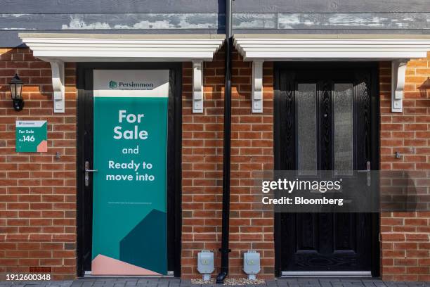 Completed houses at a Persimmon Plc residential property construction site in Colchester, UK, on Tuesday, Jan. 9, 2024. Easing mortgage rates are...