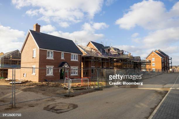 Persimmon Plc residential property construction site in Colchester, UK, on Tuesday, Jan. 9, 2024. Easing mortgage rates are widely expected to...