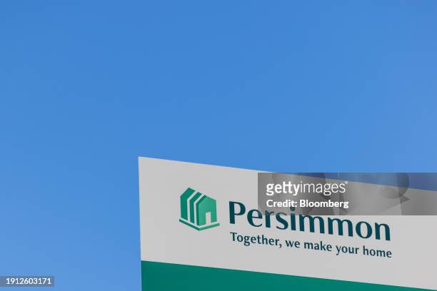 Sign at the entrance to a Persimmon Plc residential property construction site in Braintree, UK, on Tuesday, Jan. 9, 2024. Easing mortgage rates are...