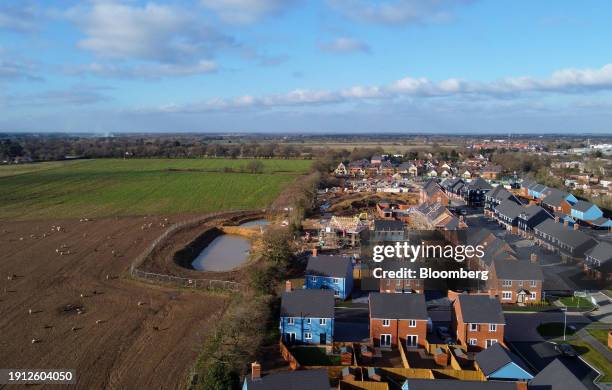Persimmon Plc residential property construction site in Colchester, UK, on Tuesday, Jan. 9, 2024. Easing mortgage rates are widely expected to...