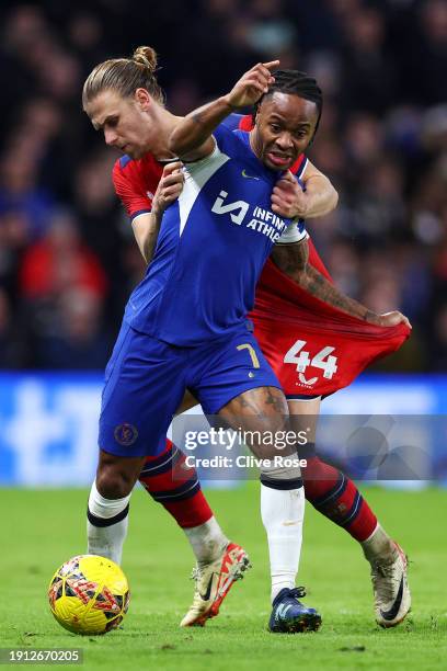 Raheem Sterling of Chelsea is challenged by Brad Potts of Preston North End during the Emirates FA Cup Third Round match between Chelsea and Preston...