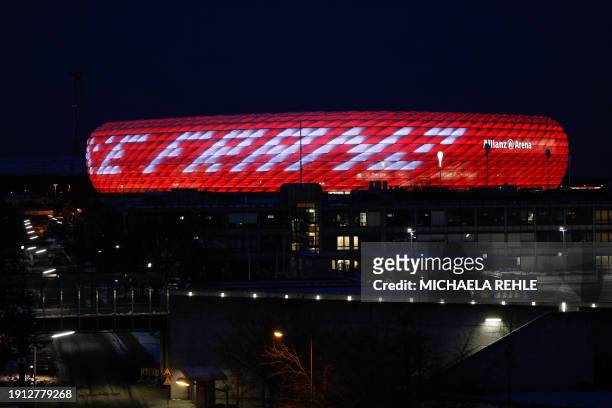 The words "Danke Franz" are projected in tribute to Franz Beckenbauer onto FC Bayern's stadium, the Allianz Arena, in Munich, southern Germany, on...