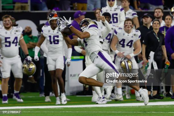 Washington Huskies wide receiver Rome Odunze makes a catch during the CFP National Championship game Michigan Wolverines and Washington Huskies on...
