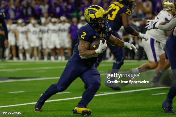 Michigan Wolverines running back Blake Corum runs the ball during the CFP National Championship game Michigan Wolverines and Washington Huskies on...