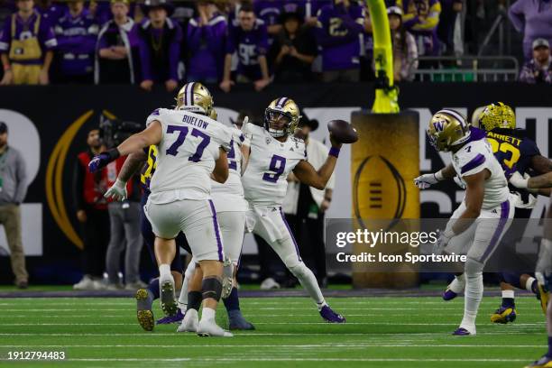 Washington Huskies quarterback Michael Penix Jr. Passes the ball during the CFP National Championship game Michigan Wolverines and Washington Huskies...