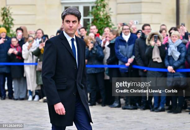 France's newly appointed Prime Minister, Gabriel Attal arrives in the courtyard of the Hotel de Matignon for the handover ceremony with his outgoing...