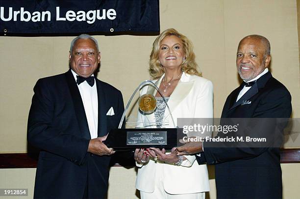 John Mack, producer Suzanne de Passe and producer Berry Gordy Jr., attend the Los Angeles Urban League's 30th anniversary benefit gala at the Century...