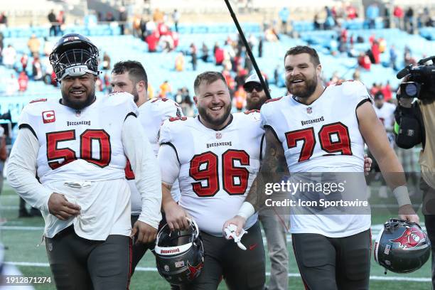 Tampa Bay Buccaneers defensive tackle Vita Vea , defensive tackle Greg Gaines and defensive end Pat O'Connor during an NFL football game between the...