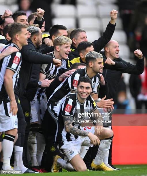 The Newcastle squad pose for a celebration picture after the Emirates FA Cup Third Round match between Sunderland and Newcastle United at Stadium of...