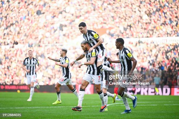 Joelinton, Miguel Almiron and Alexander Isak of Newcastle United celebrate Sunderland scoring an own goal during the Emirates FA Cup Third Round...