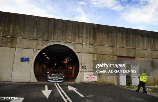 British former Formula One and Moto GP world champion John Surtees exits the Channel tunnel in a Ginetta G50EV electric sports car prototype in...