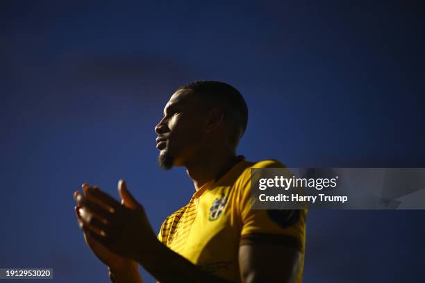 Omar Sowunmi of Sutton United interact with the crowd following the Emirates FA Cup Third Round match between Plymouth Argyle and Sutton United at...