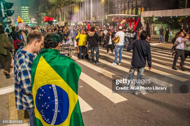 Protesting on Paulista Avenue against the increase in tariffs of Public Transport, Sao Paulo, Brazil.