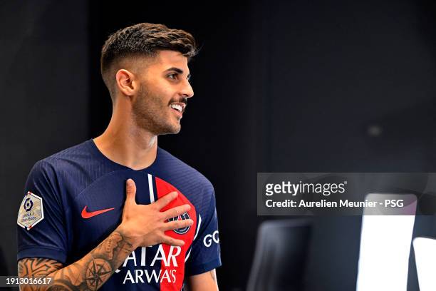 Lucas Beraldo poses for a photoshoot after signing a 5 year contract with Paris Saint-Germain at Campus PSG on January 01, 2024 in Paris, France.