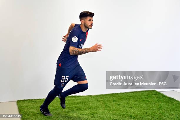 Lucas Beraldo poses for a photoshoot after signing a 5 year contract with Paris Saint-Germain at Campus PSG on January 01, 2024 in Paris, France.