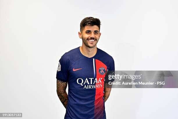 Lucas Beraldo poses for a photoshoot after signing a 5 year contract with Paris Saint-Germain at Campus PSG on January 01, 2024 in Paris, France.