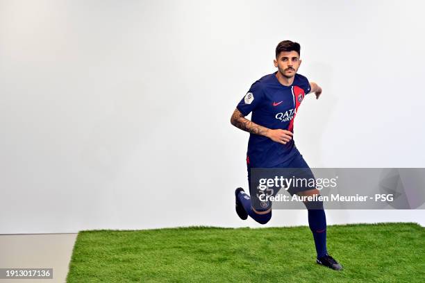 Lucas Beraldo poses for a photoshoot after signing a 5 year contract with Paris Saint-Germain at Campus PSG on January 01, 2024 in Paris, France.