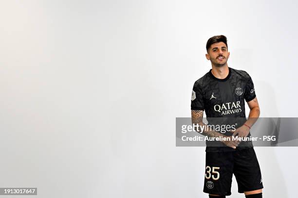 Lucas Beraldo poses for a photoshoot after signing a 5 year contract with Paris Saint-Germain at Campus PSG on January 01, 2024 in Paris, France.