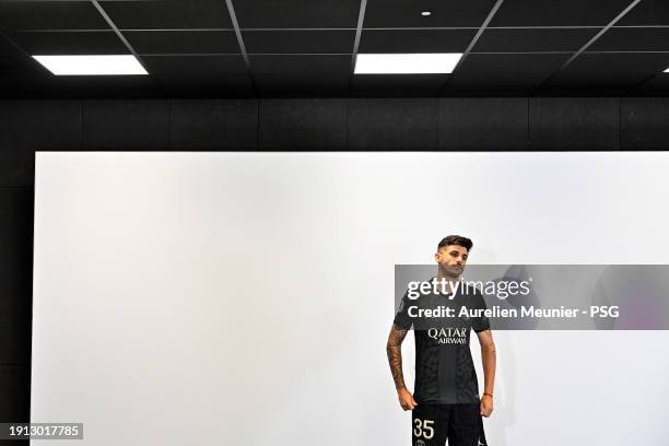 Lucas Beraldo poses for a photoshoot after signing a 5 year contract with Paris Saint-Germain at Campus PSG on January 01, 2024 in Paris, France.