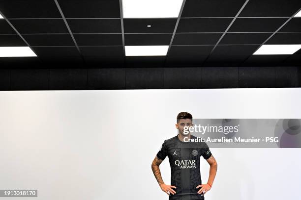 Lucas Beraldo poses for a photoshoot after signing a 5 year contract with Paris Saint-Germain at Campus PSG on January 01, 2024 in Paris, France.