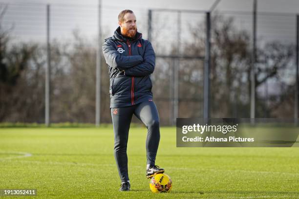 Ryan Harley, assistant head coach watches on as the players train during the Swansea City Training Session at The Fairwood Training Ground on January...