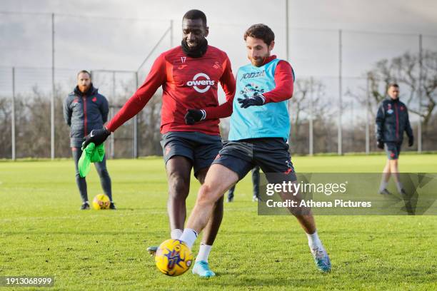 Yannick Bolasie and Joe Allen in action during the Swansea City Training Session at The Fairwood Training Ground on January 05, 2024 in Swansea,...