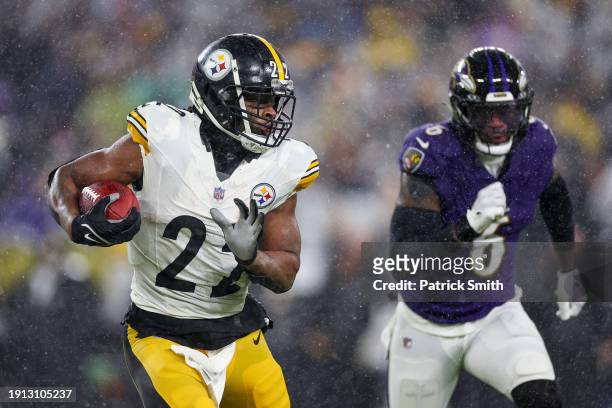Najee Harris of the Pittsburgh Steelers runs the ball up the field in the second quarter of a game against the Baltimore Ravens at M&T Bank Stadium...