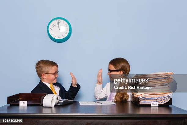 boy and girl team working together - business girl stock pictures, royalty-free photos & images