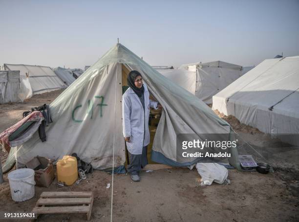 Doctor Fida Atiyya al-Girshalli provides medical service for the Palestinians who live in tents after being displaced from Shujaiyye city to Rafah as...