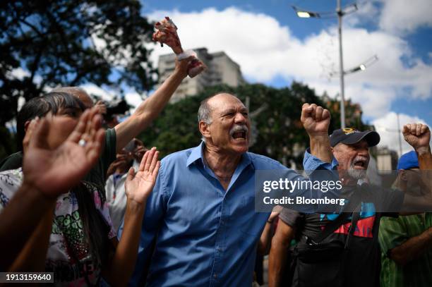 Demonstrators during a protest in support of public sector workers outside the Public Ministry of Venezuela headquarters in Caracas, Venezuela, on...