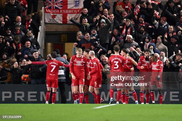 Middlesbrough's English midfielder Hayden Hackney celebrates after scoring his team first goal during the English League Cup first-leg semi-final...