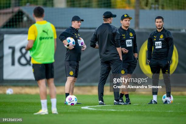 Manager Edin Terzic, Co-Trainer Nuri Sahin, Co-Trainer Sebastian Geppert, and Co-Trainer Sven Bender of Borussia Dortmund during a training session...