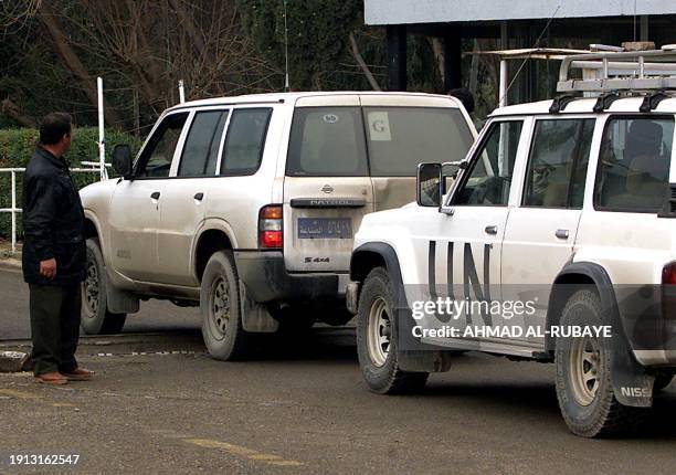 Verification, Monitoring and Inspection Commission experts' convoy enters the Salah Eddine military facility in Tikrit, 150 kms north of Baghdad 15...