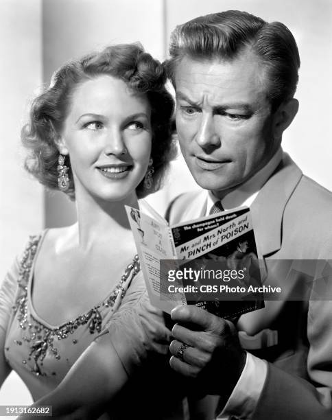 Pictured is Richard Denning and Barbara Britton in the CBS television comedy-detective series, Mr. And Mrs. North. August 1, 1952.