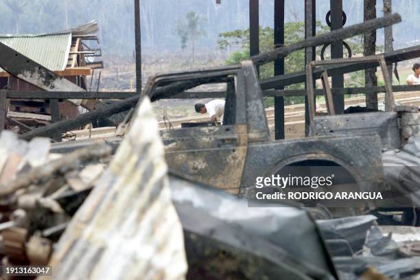 Man seen the rubbish at a factory for the Fuerzas Armadas Revolucionarias de Colombia , 140 km away from San Vicente del Caguan, Colombia, 25...