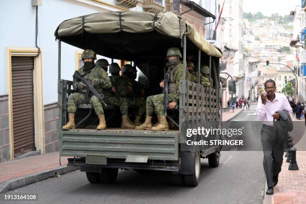 Ecuadorean security forces patrol the area around the main square and presidential palace after Ecuadorean President Daniel Noboa declared the...