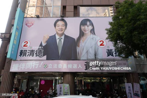 This picture taken on January 9, 2024 shows a portrait poster of Huang Jie , Kaohsiung city councillor and the Democratic Progressive Party...