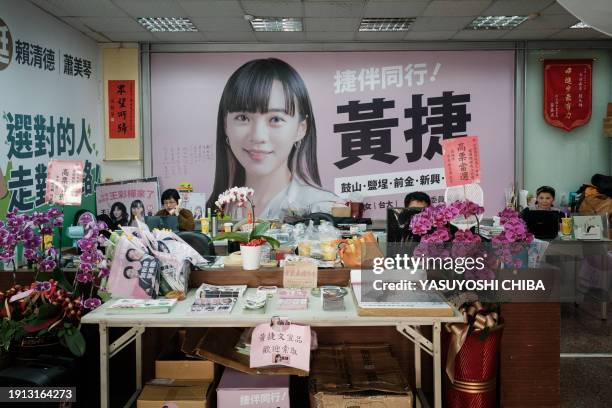 This picture taken on January 9, 2024 shows a portrait poster of Huang Jie, Kaohsiung city councillor and the Democratic Progressive Party...