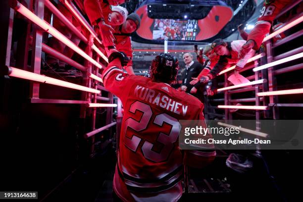 Philipp Kurashev of the Chicago Blackhawks walks out to the ice prior to the game against the Edmonton Oilers at the United Center on January 09,...