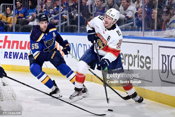 Matthew Tkachuk of the Florida Panthers controls the puck as Colton Parayko of the St. Louis Blues pressures on January 9, 2024 at the Enterprise...