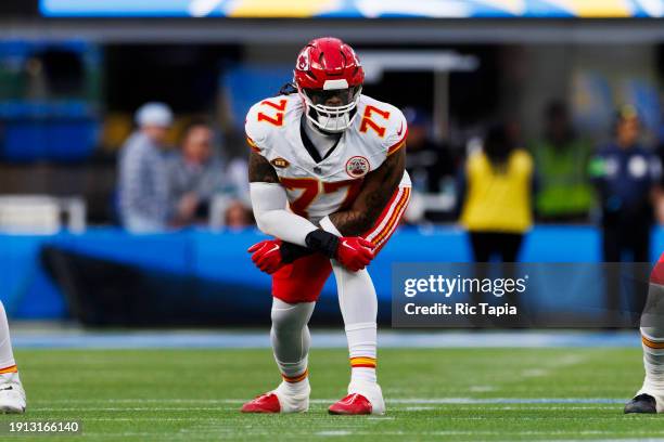 Lucas Niang of the Kansas City Chiefs in an offensive stance during a game against the Los Angeles Chargers at SoFi Stadium on January 7, 2024 in...